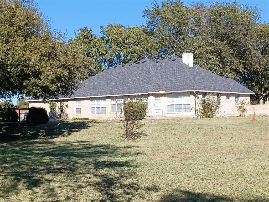 109 Cole Road Red Oak, TX 75154 - Photo 28 of 39 a view of a house with a yard