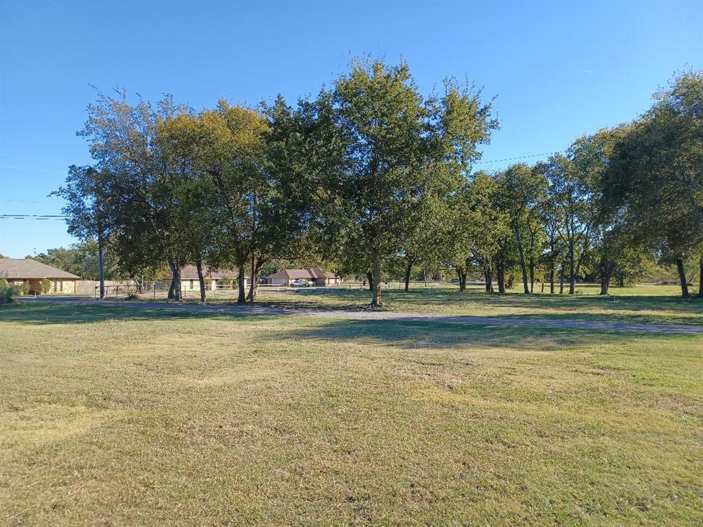 109 Cole Road Red Oak, TX 75154 - Photo 31 of 39 a view of a house with a yard and tree s