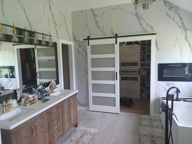 a bathroom with a sink and a mirror