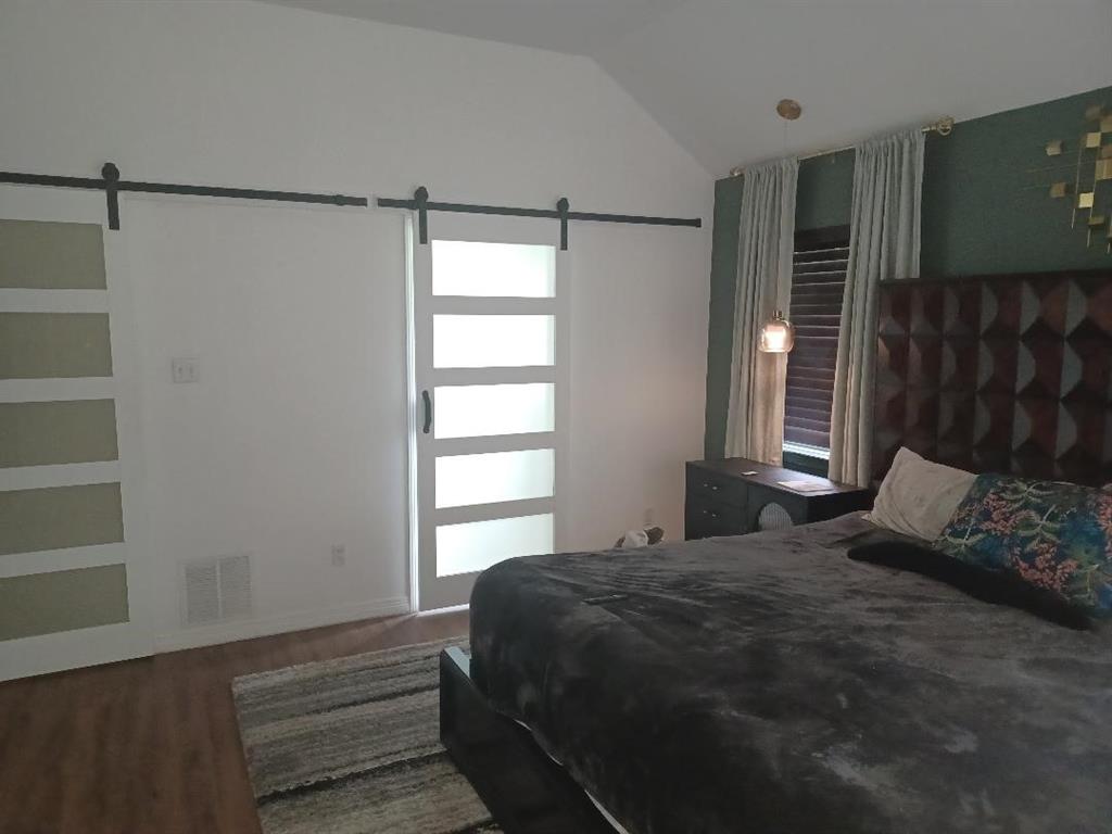 109 Cole Road Red Oak, TX 75154 - Photo 7 of 39 a bedroom with a bed and a window