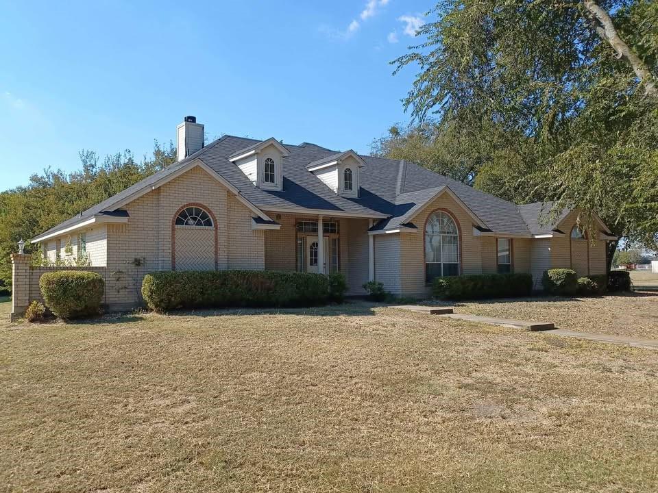 109 Cole Road Red Oak, TX 75154 - Photo 9 of 39 a front view of a house with a yard