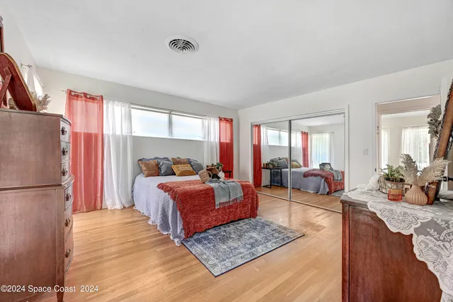 a bed room with bed and a couch