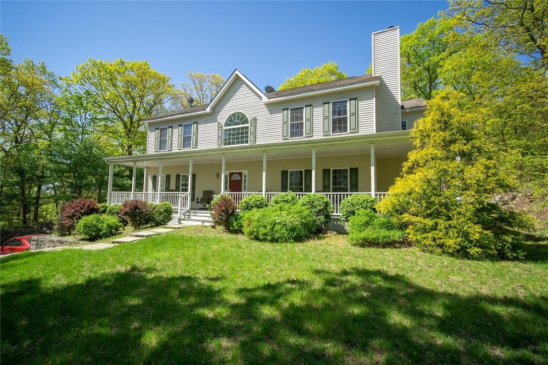 227 Ice Pond Road Brewster, NY 10509 - Photo 1 of 1 a front view of a house with a yard