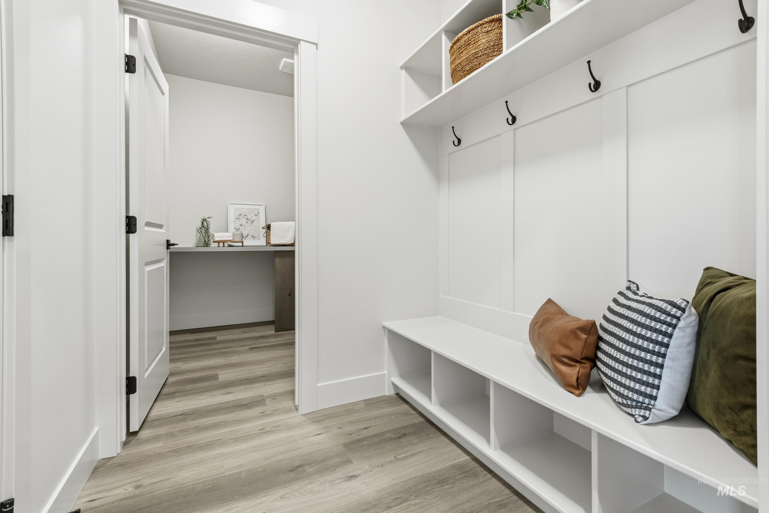 1988 West Bittern Street Nampa, ID 83686 - Photo 29 of 34 Mudroom featuring light wood-type flooring and baseboards