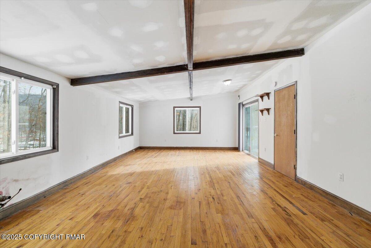 5695 Decker Road Bushkill, PA 18324 - Photo 14 of 29 a view of an empty room with windows