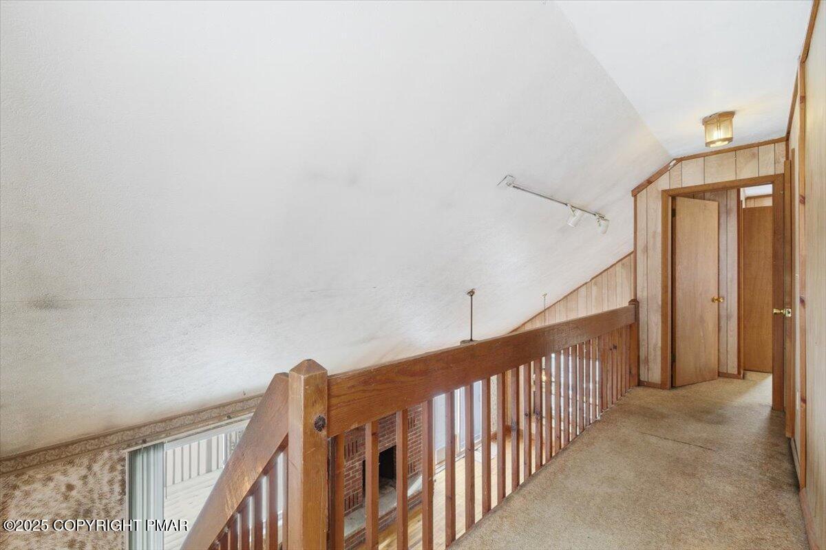 5695 Decker Road Bushkill, PA 18324 - Photo 19 of 29 a view of a hallway with staircase