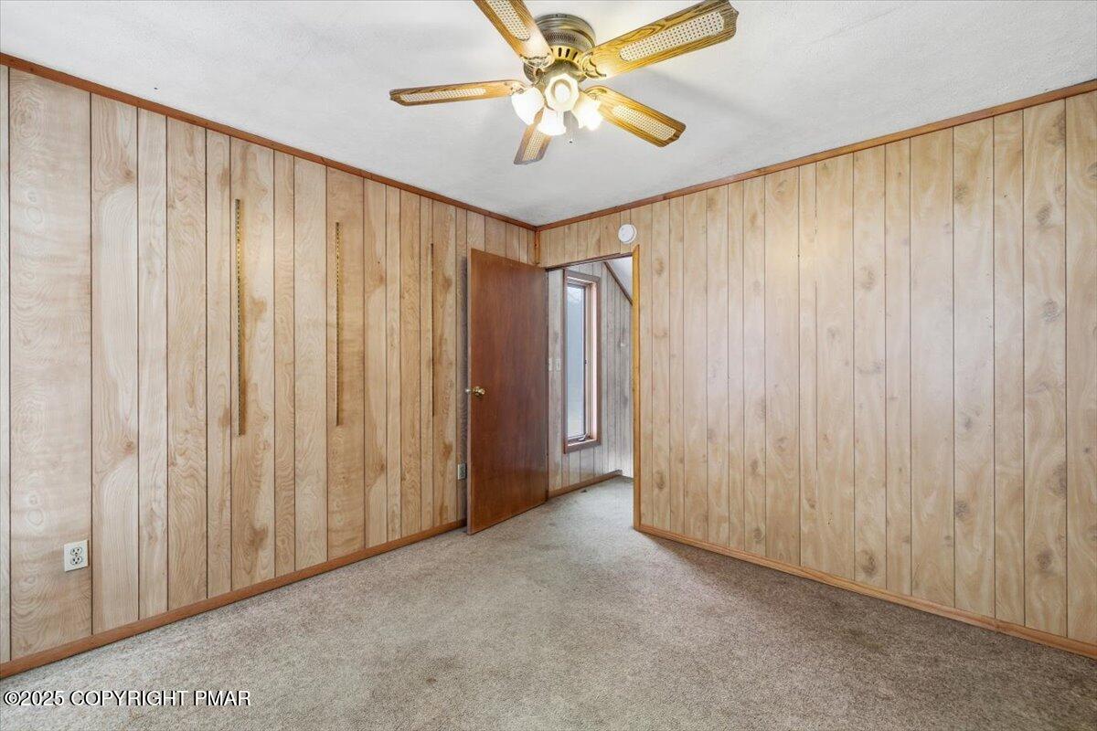 5695 Decker Road Bushkill, PA 18324 - Photo 21 of 29 a view of a room with a window and a chandelier