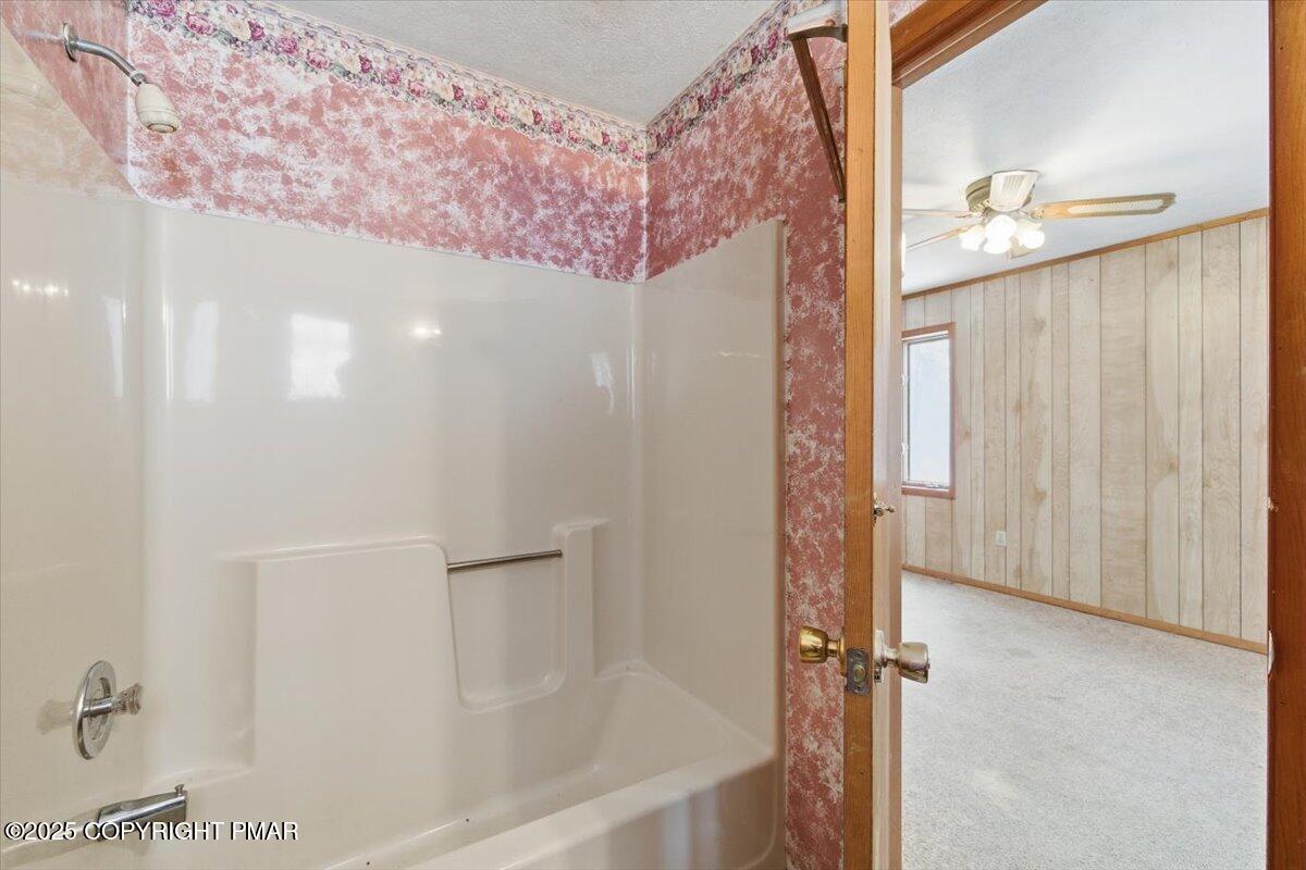 5695 Decker Road Bushkill, PA 18324 - Photo 23 of 29 a bathroom with a bathtub and shower