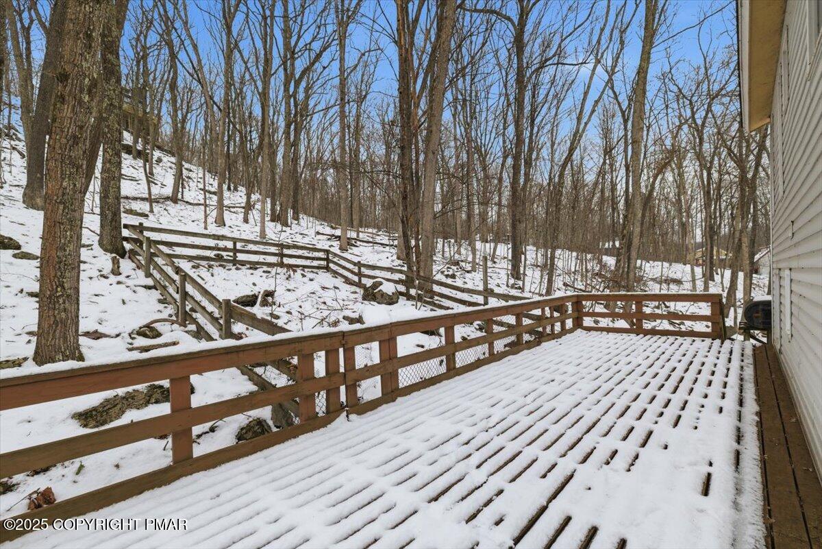 5695 Decker Road Bushkill, PA 18324 - Photo 26 of 29 a view of wooden deck with a trees