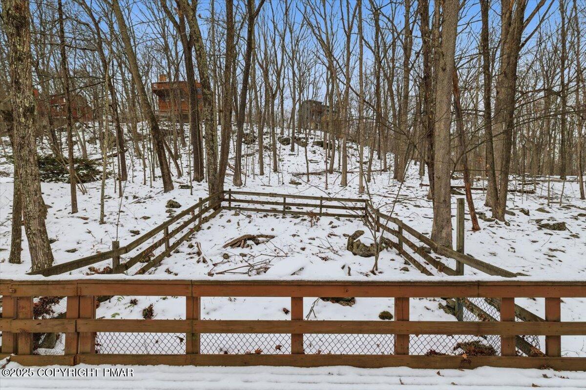 5695 Decker Road Bushkill, PA 18324 - Photo 28 of 29 a view of a wooden fence and trees