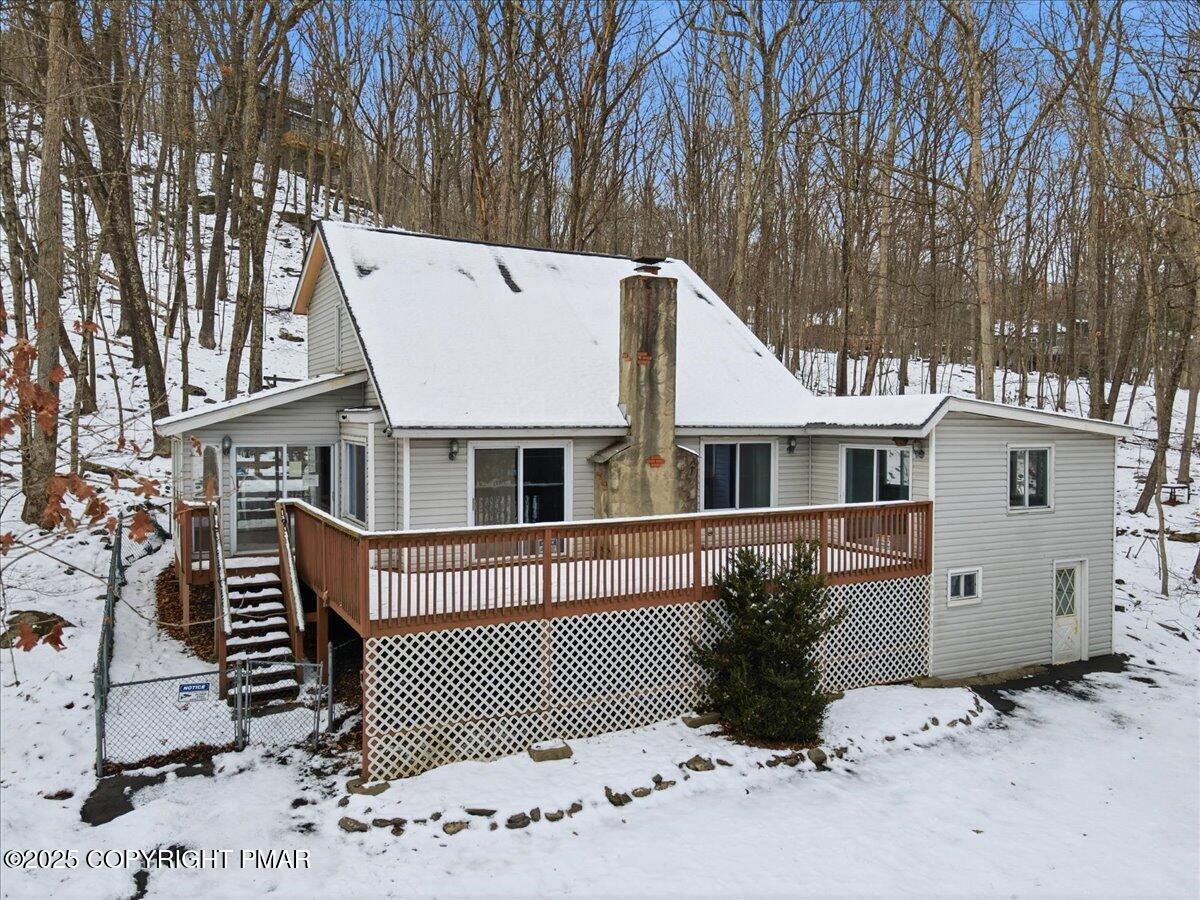 5695 Decker Road Bushkill, PA 18324 - Photo 29 of 29 a view of a house with a wooden deck