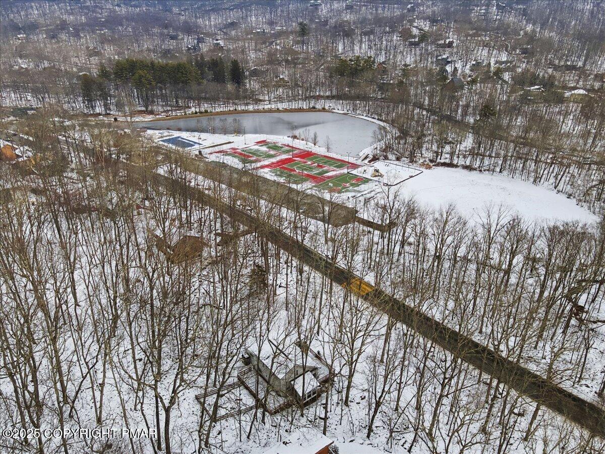 5695 Decker Road Bushkill, PA 18324 - Photo 3 of 29 a view of swimming pool from a balcony