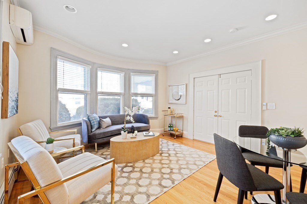 12 Colliston Road, Unit 2 Boston, MA 02135 - Photo 1 of 10 a living room with furniture and a window