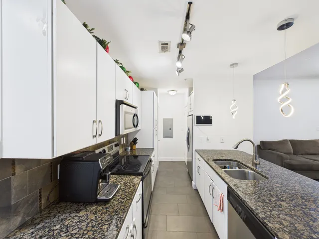 a bathroom with a sink and mirror