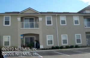 7920 Merrill Road, Unit 1115 Jacksonville, FL 32277 - Photo 1 of 6 a front view of a house