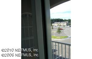 7920 Merrill Road, Unit 1115 Jacksonville, FL 32277 - Photo 4 of 6 a view of a glass door