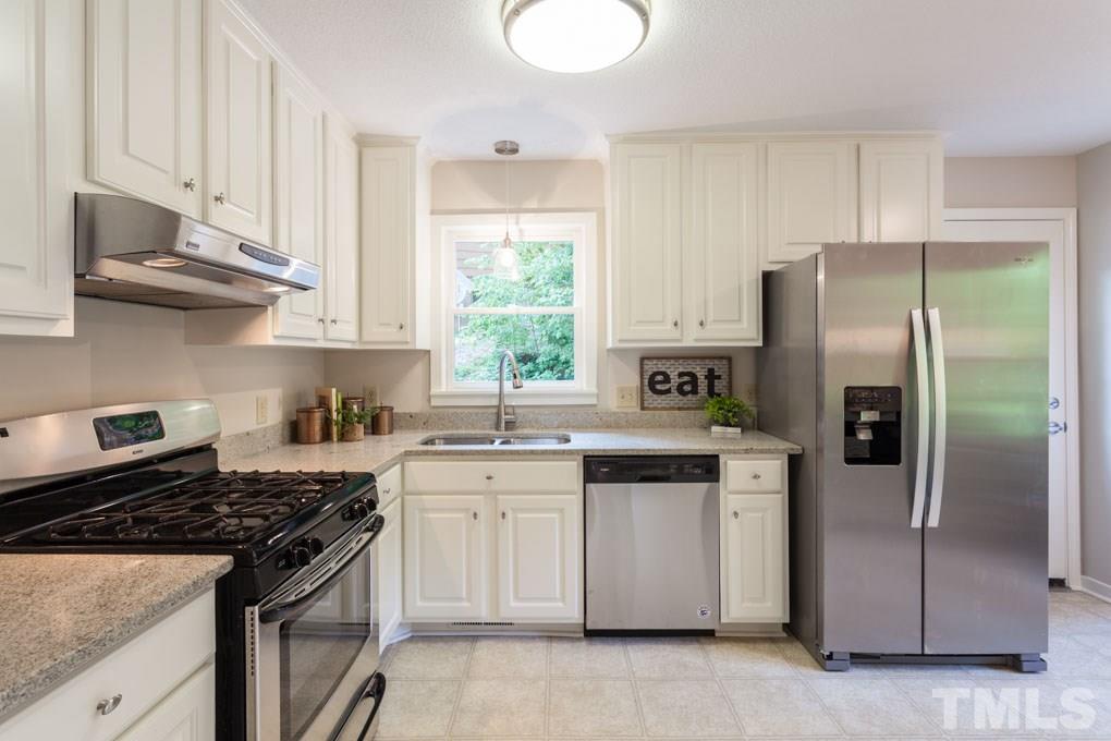 6109 Valleyfield Circle Raleigh, NC 27612 - Photo 6 of 11 PLENTY of storage, brand-new GRANITE and SS appliances
