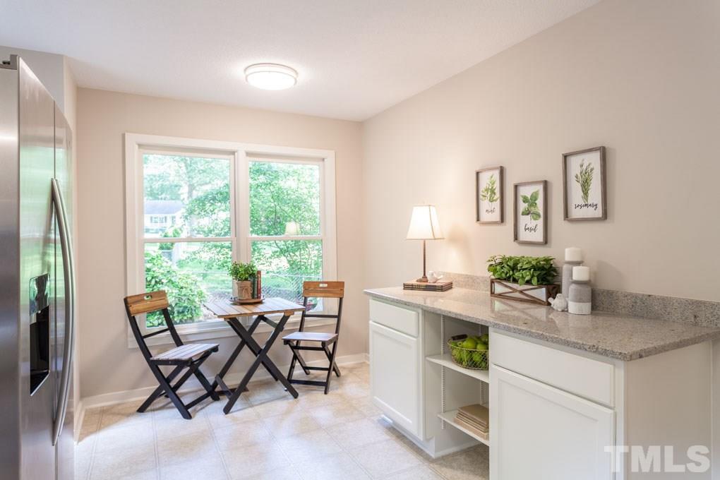 6109 Valleyfield Circle Raleigh, NC 27612 - Photo 7 of 11 Enjoy breakfast while looking out into the beautiful backyard. Plenty of STORAGE and COUNTERSPACE