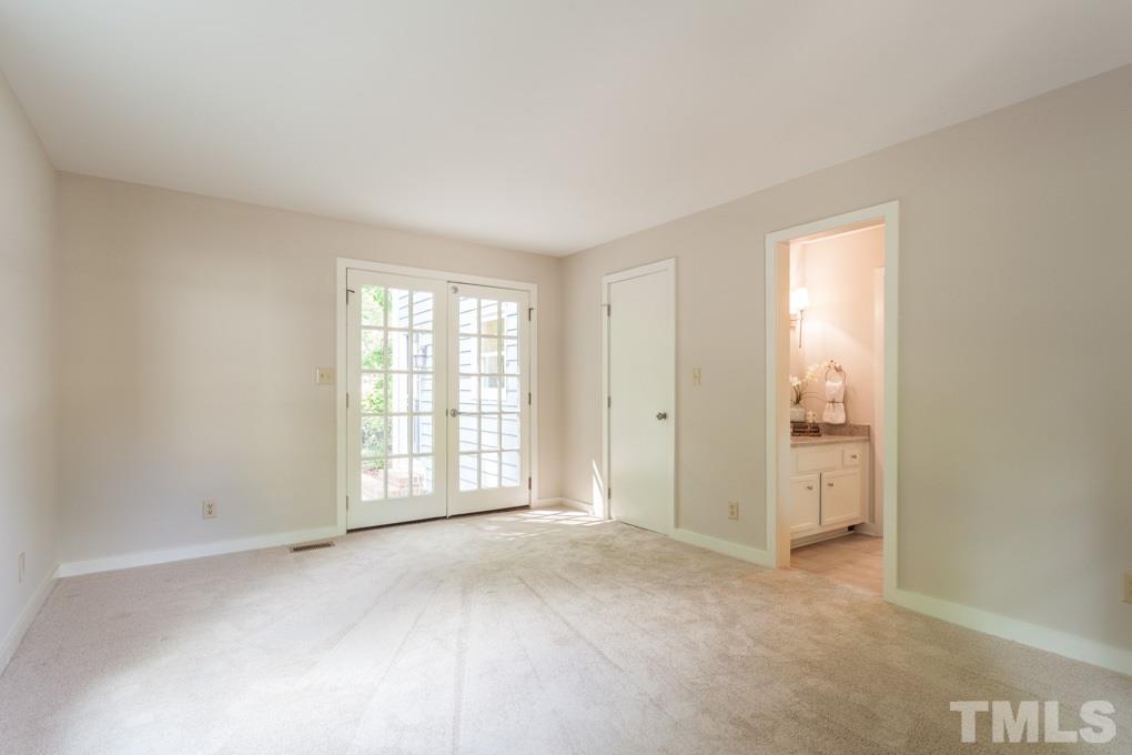 6109 Valleyfield Circle Raleigh, NC 27612 - Photo 8 of 11 HUGE master bedroom with FRENCH DOORS leading to backyard