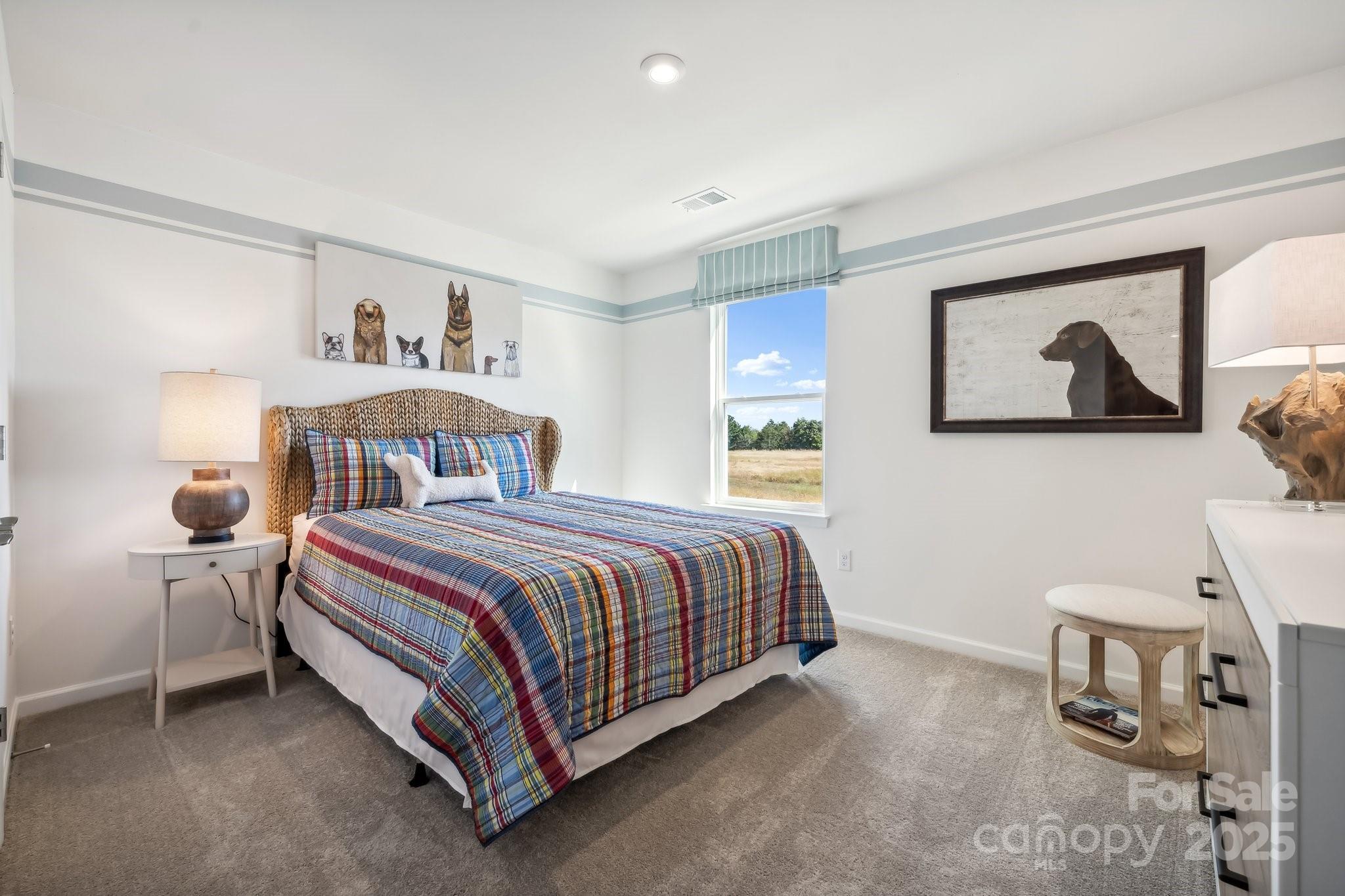 1088 Arundle Road Sherrills Ford, NC 28673 - Photo 11 of 31 a bedroom with a bed and a window