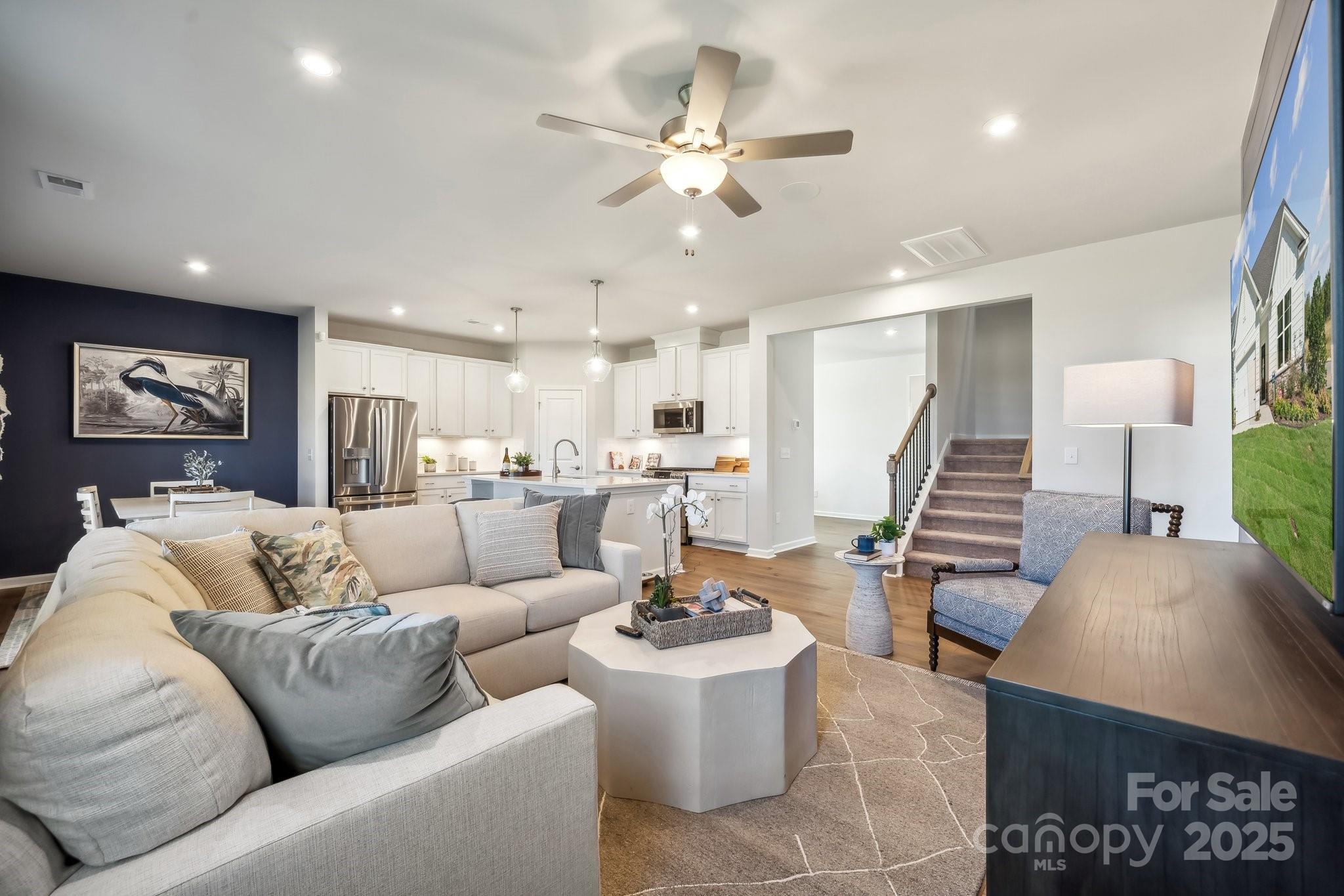 1088 Arundle Road Sherrills Ford, NC 28673 - Photo 22 of 31 a living room with furniture and wooden floor