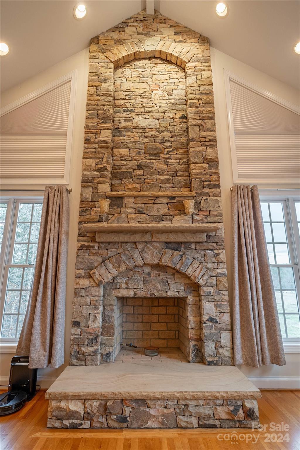 3292 Deal Mill Road Hudson, NC 28638 - Photo 9 of 44 a room with a fireplace and a rug