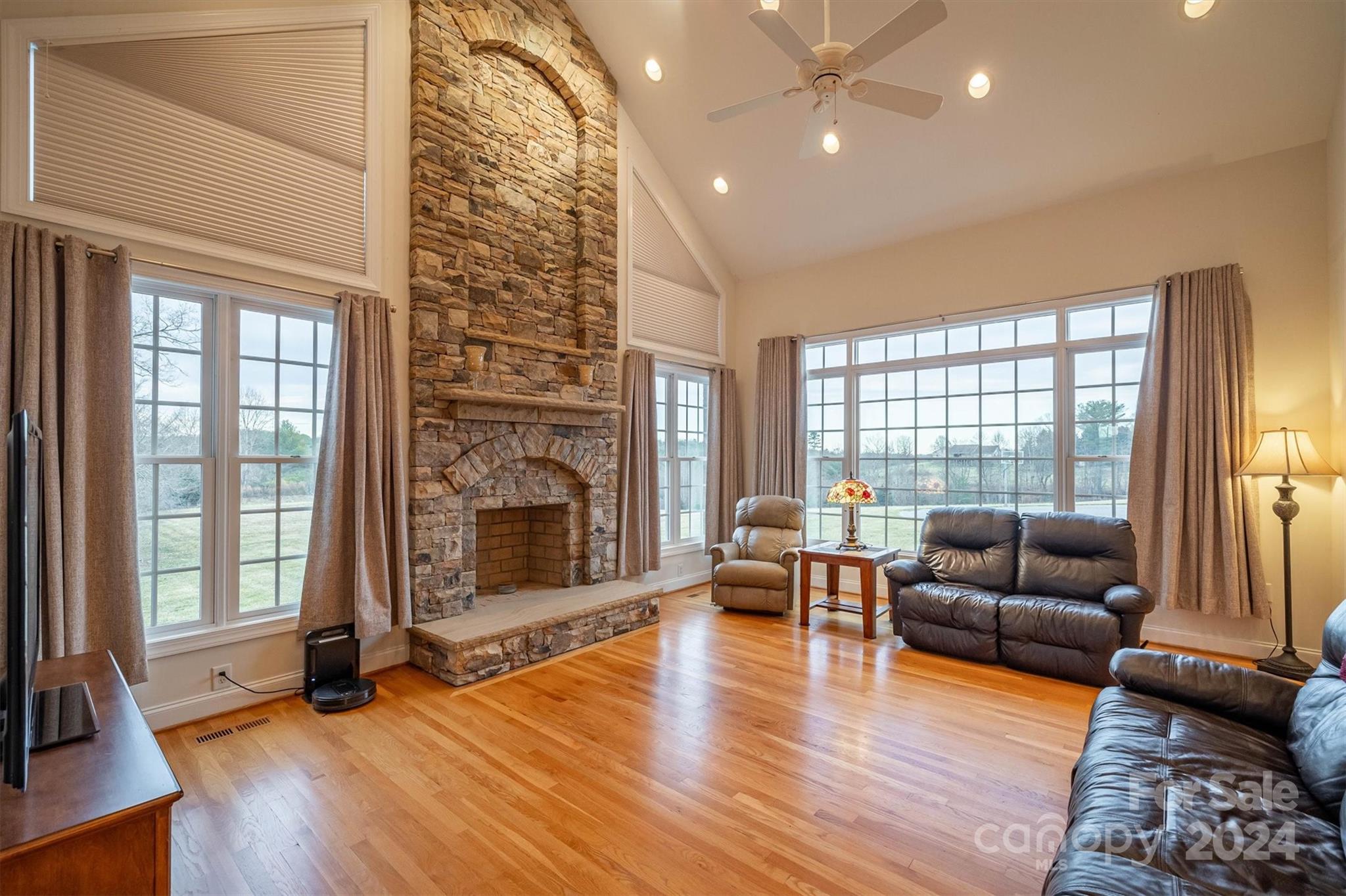3292 Deal Mill Road Hudson, NC 28638 - Photo 10 of 44 a living room with furniture and a fireplace