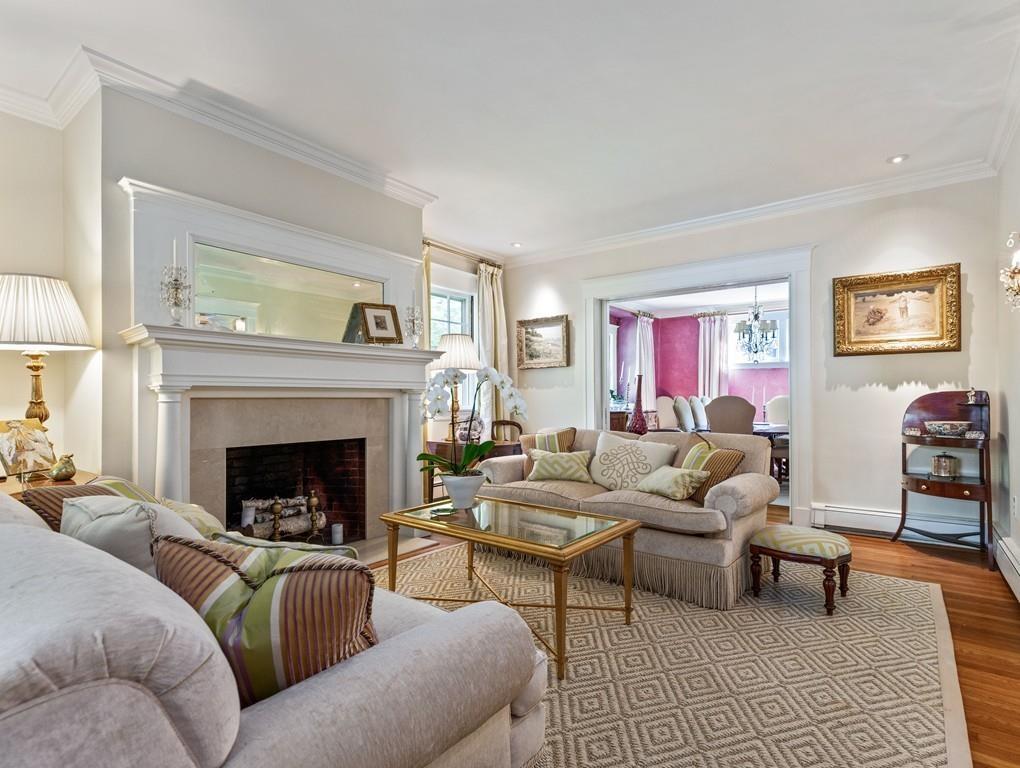 101 Abbott Road Wellesley, MA 02481 - Photo 11 of 38 a living room with furniture and a fireplace