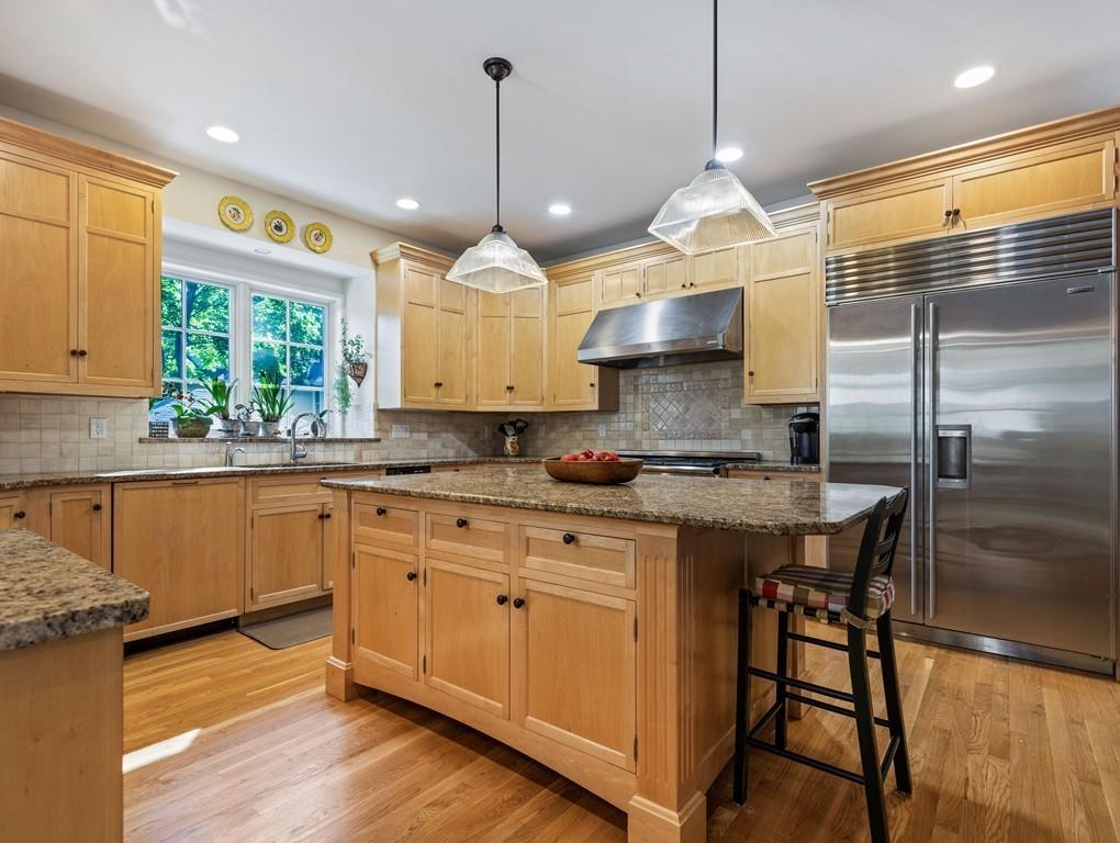 101 Abbott Road Wellesley, MA 02481 - Photo 15 of 38 a kitchen with stainless steel appliances granite countertop a sink a stove and a refrigerator