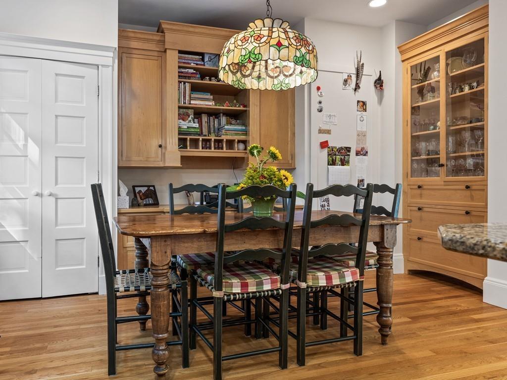 101 Abbott Road Wellesley, MA 02481 - Photo 16 of 38 a view of a dining room with furniture and wooden floor