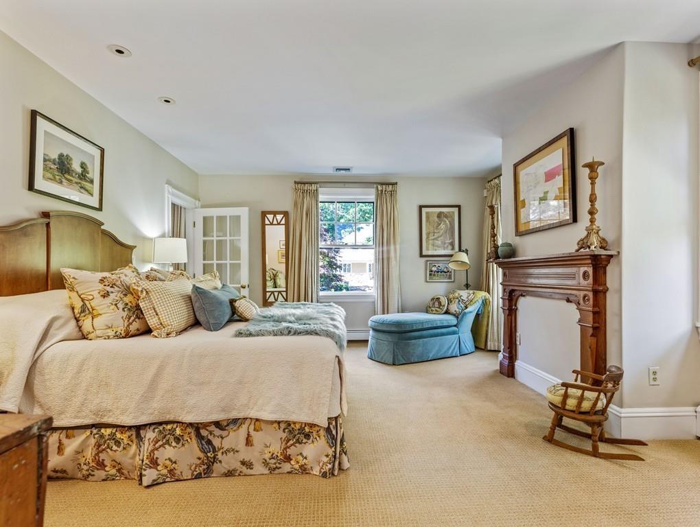 101 Abbott Road Wellesley, MA 02481 - Photo 22 of 38 a bed room with a bed and furniture
