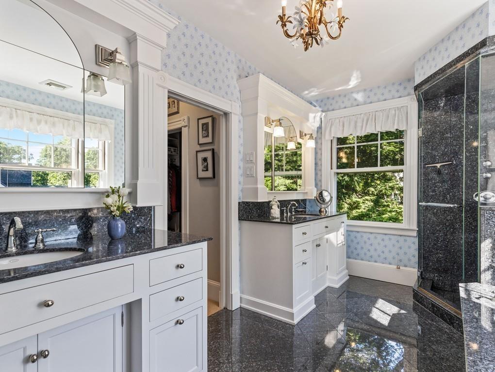 101 Abbott Road Wellesley, MA 02481 - Photo 24 of 38 a kitchen with stainless steel appliances granite countertop a stove a sink and a refrigerator