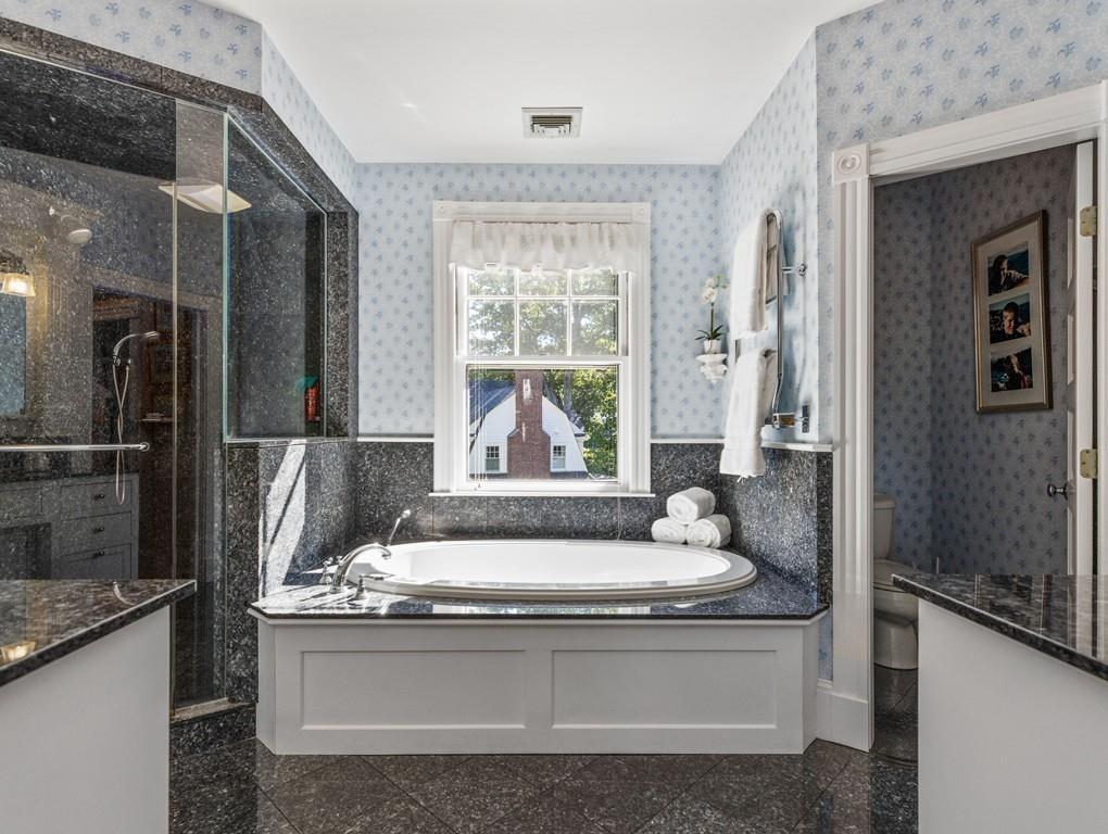 101 Abbott Road Wellesley, MA 02481 - Photo 25 of 38 a living room with stainless steel appliances granite countertop furniture and a window