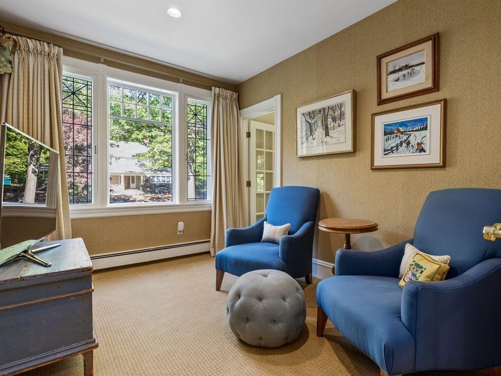 101 Abbott Road Wellesley, MA 02481 - Photo 26 of 38 a living room with furniture and a large window