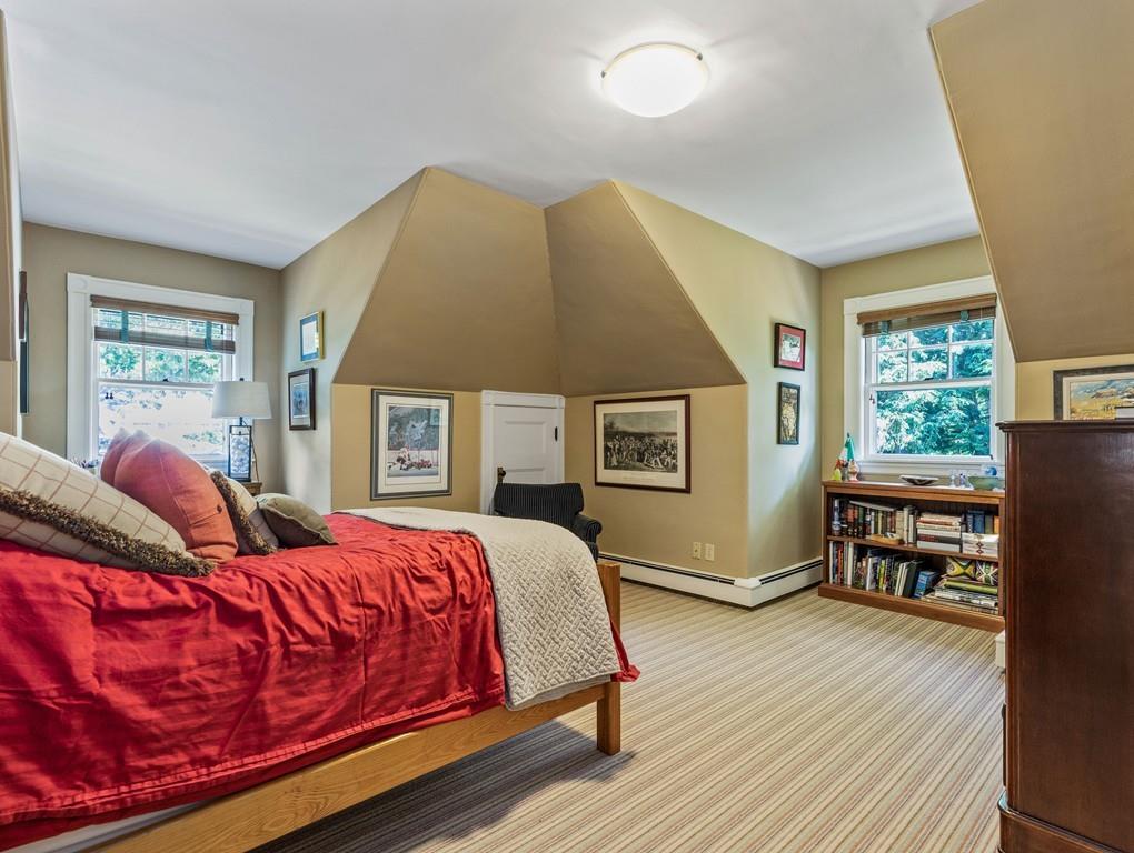 101 Abbott Road Wellesley, MA 02481 - Photo 31 of 38 a bed room with a bed window and a dresser