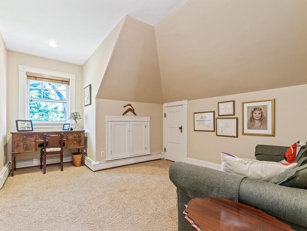 101 Abbott Road Wellesley, MA 02481 - Photo 33 of 38 a living room with furniture window and a table