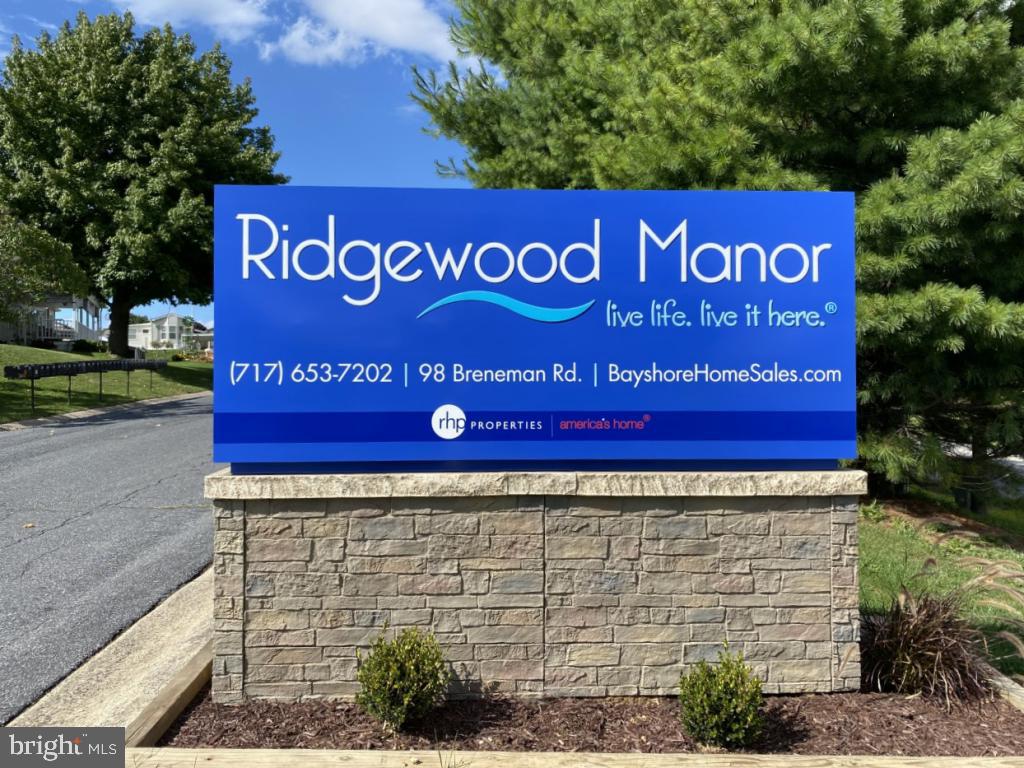 11 Ridgewood Manor Manheim, PA 17545 - Photo 24 of 37 a sign broad on the side of the road