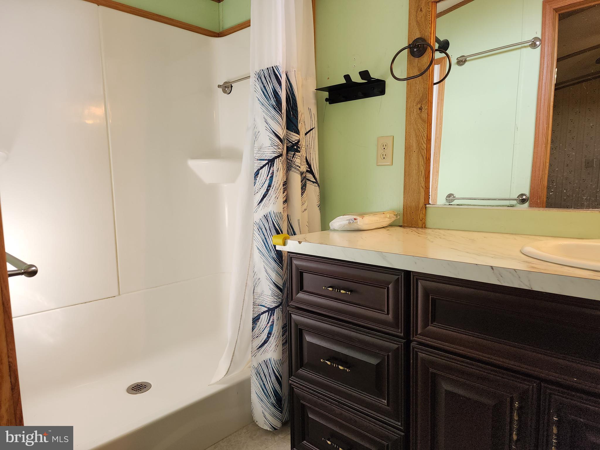 11 Ridgewood Manor Manheim, PA 17545 - Photo 31 of 37 a bathroom with a sink and a mirror
