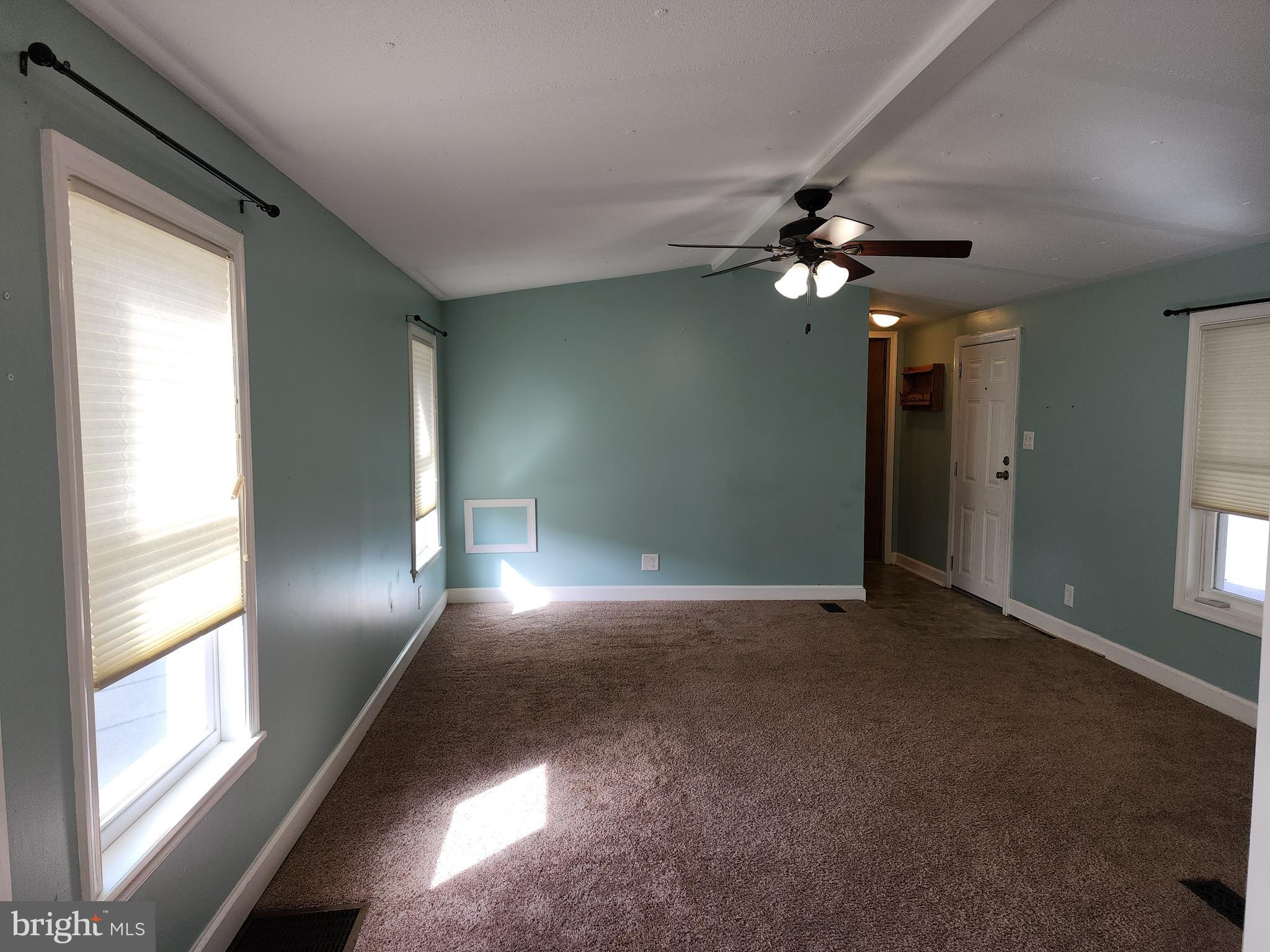 11 Ridgewood Manor Manheim, PA 17545 - Photo 6 of 37 a view of an empty room with a window