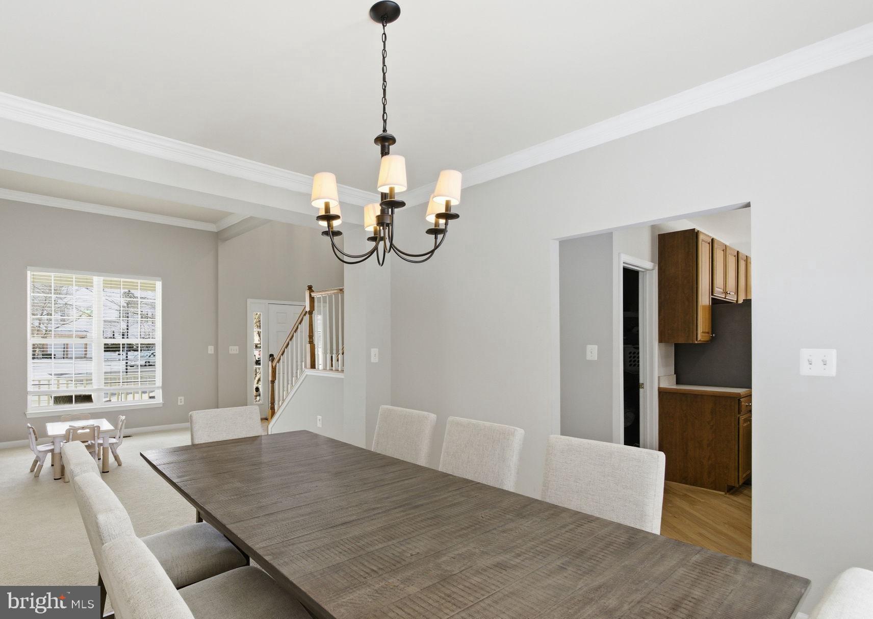 13119 Bigleaf Maple Court Gainesville, VA 20155 - Photo 17 of 36 a view of a livingroom with furniture window and wooden floor