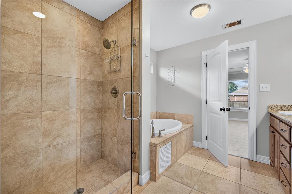 4814 Hilre Drive Sherman, TX 75092 - Photo 16 of 27 a bathroom with a shower and a sink