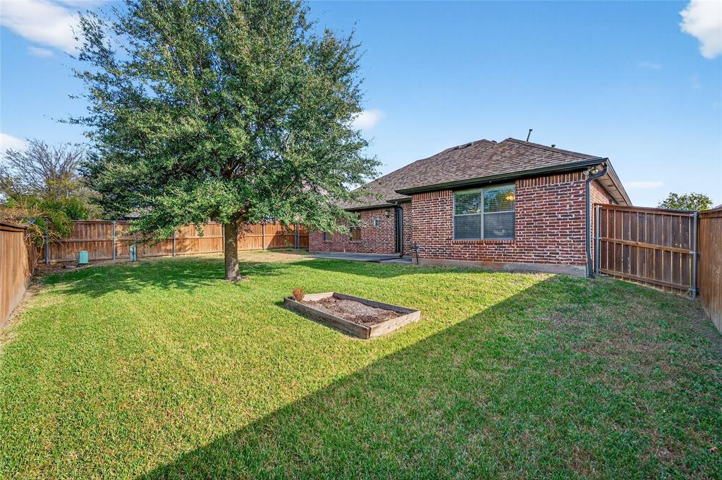 4814 Hilre Drive Sherman, TX 75092 - Photo 26 of 27 a front view of a house with a yard