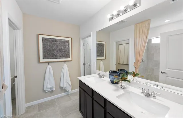 $319,990 | 630 Lakeside Oasis Avenue, Lehigh Acres, FL 33974