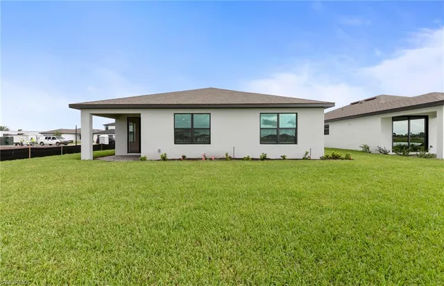 $319,990 | 630 Lakeside Oasis Avenue, Lehigh Acres, FL 33974