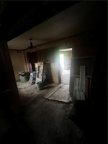 a view of empty room with windows