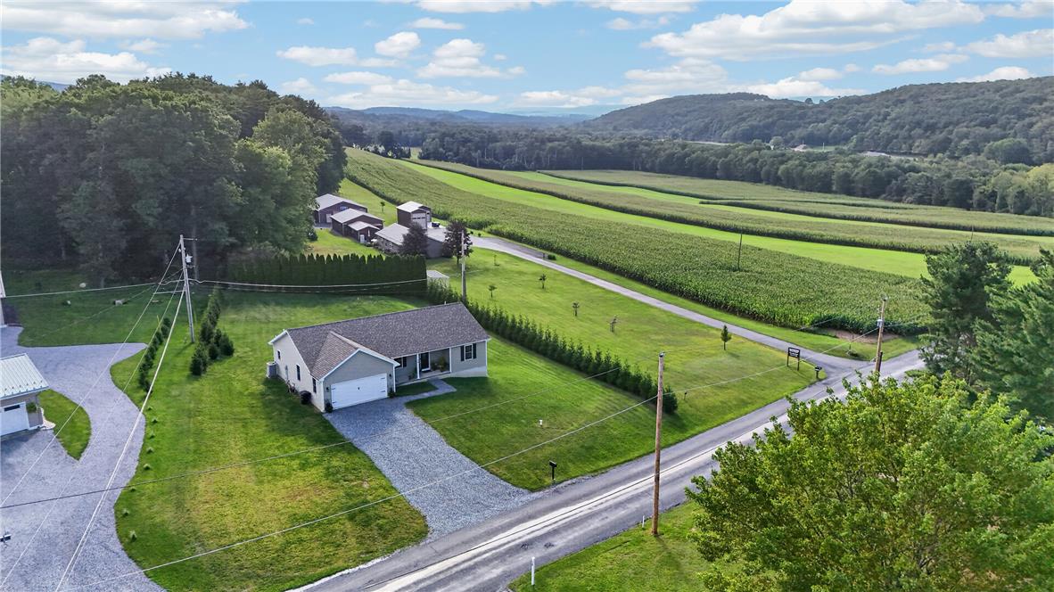74 Kepners Road New Ringgold, PA 17960 - Photo 2 of 79 Rolling hills and vast green fields frame this serene countryside property.