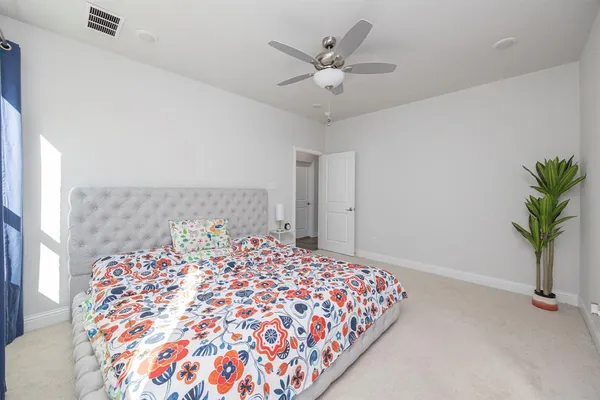 a bathroom with a granite countertop sink a shower and a mirror
