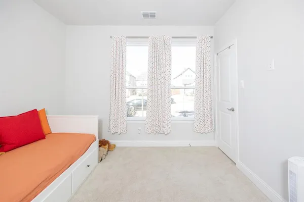 a bathroom with a sink toilet and mirror