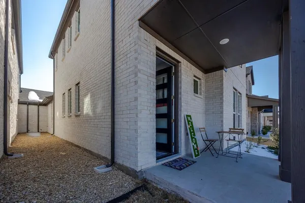 a view of a porch with seating space