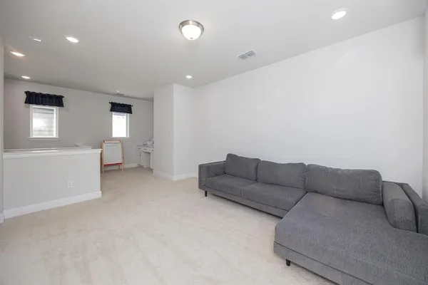 a bathroom with 2 sink and a mirror